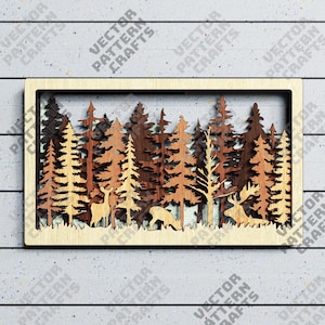 May include: A wooden forest scene with layered trees and wildlife, including deer and a moose. The artwork is framed in a light wood border, with the text "VECTOR PATTERN CRAFTS" visible.