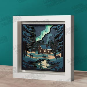 Vinterstuga Shadow Box SVG Laserskuren norrskenshjort väggkonst
