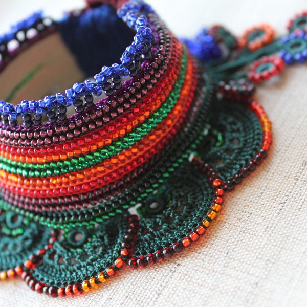 Sambucus Racemosa : beaded crochet bracelet with dark forest green, orange, crimson red, purple beads and crochet lace