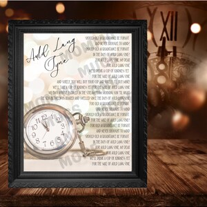 May include: A framed print featuring the lyrics of "Auld Lang Syne" with a vintage pocket watch. The print has a black frame and a sepia-toned background. The pocket watch is silver with a white clock face.
