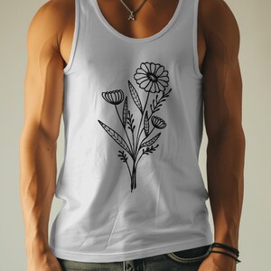 May include: A white tank top featuring a black floral design. The design includes a large flower with smaller flowers and leaves.