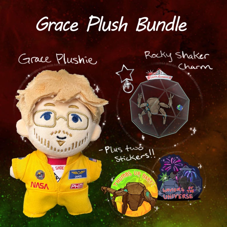 May include: A Grace Plush Bundle featuring a plush doll with blonde hair and glasses wearing a yellow NASA flight suit, a Rocky Shaker Charm with a geometric design, and two stickers, one reading Thumbs Up Baby and the other Saviors of the Universe.