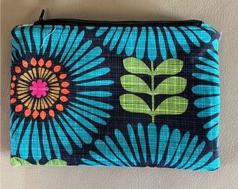 Zipped Pouch with Covered Zip Ends.
