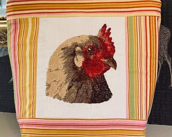Grande pochette zippée avec motif poulet.