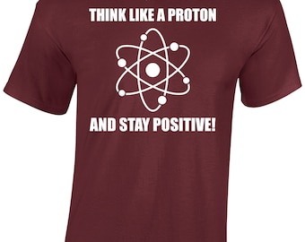 Think like a proton mens t shirt stay positive funny science atom neutron bbt