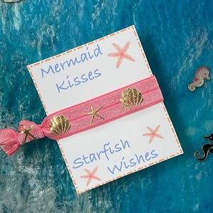 Mermaid & Seashell Hair Ties: Beach Trip-Cruise Favors.  Includes card and Pixie Dust bag.
