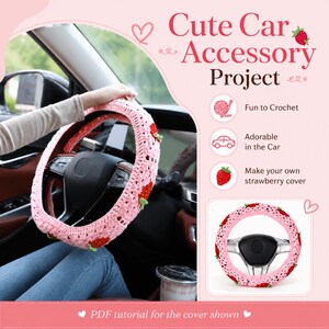 May include: A pink crocheted steering wheel cover with red strawberry accents. The cover is on a car steering wheel. The image includes the text "Cute Car Accessory Project" and "Make your own strawberry cover".