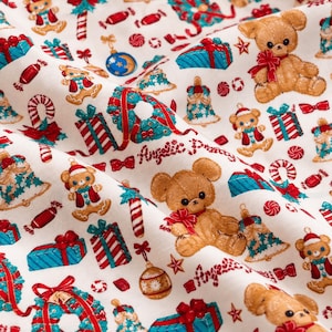 May include: A cream-coloured fabric featuring a repeating pattern of brown teddy bears wearing red bows, teal and red gift boxes, candy canes, Christmas wreaths, bells, and ornaments. The text "Angelic Pretty" is printed in a cursive red font.