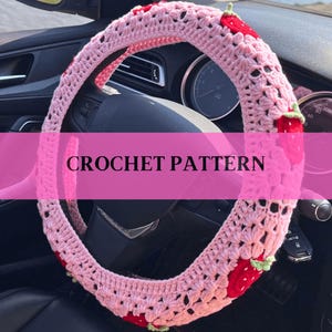 May include: Pink crocheted steering wheel cover with strawberry accents. Crochet pattern.