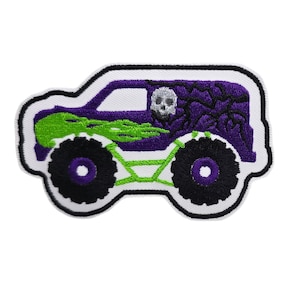 May include: Purple and green monster truck embroidered patch with a skull and bat design.
