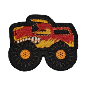 May include: Red and yellow embroidered monster truck patch with black tires.