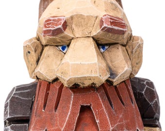 Arthur Strongbrow - handcarved caricature with a big backpack