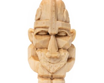 Little handcarved dwarven warrior with winged helmet