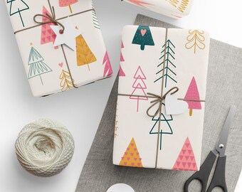 May include: Gift-wrapped presents with colorful Christmas tree patterns. Each package is tied with twine and a white tag. A spool of twine, scissors, and blank tags are also visible, suggesting a DIY gift-wrapping theme.
