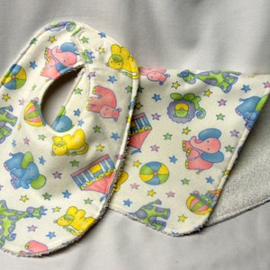 Special-Bib and Burp Cloth Baby Girl, Baby Shower Gift, Welcome Baby Gift:  Pastel Elephants, Lions, Beachballs  and Giraffes