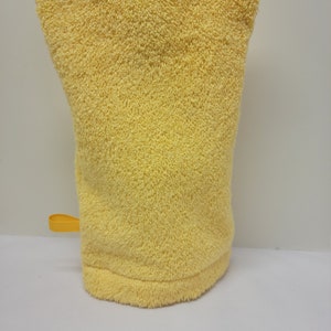 May include: A yellow microfiber cleaning mitt with a yellow loop handle.