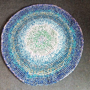 A crocheted rug in retro style. For warmth of feet, for pets, for beauty. Like your favorite grandmother in the village.