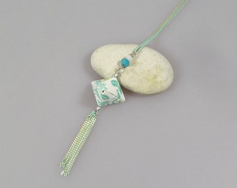 origami necklace in blue green and white japanese paper