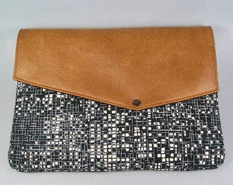 Cover, black and gold jacquard laptop sleeve