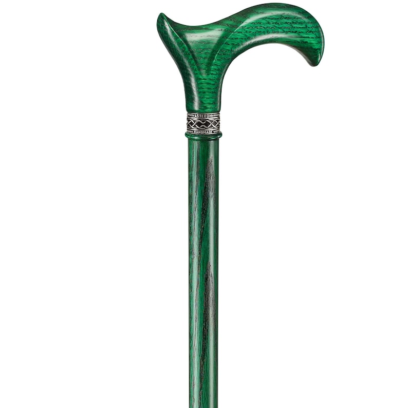 May include: A green wooden walking stick with a curved handle and a silver band.