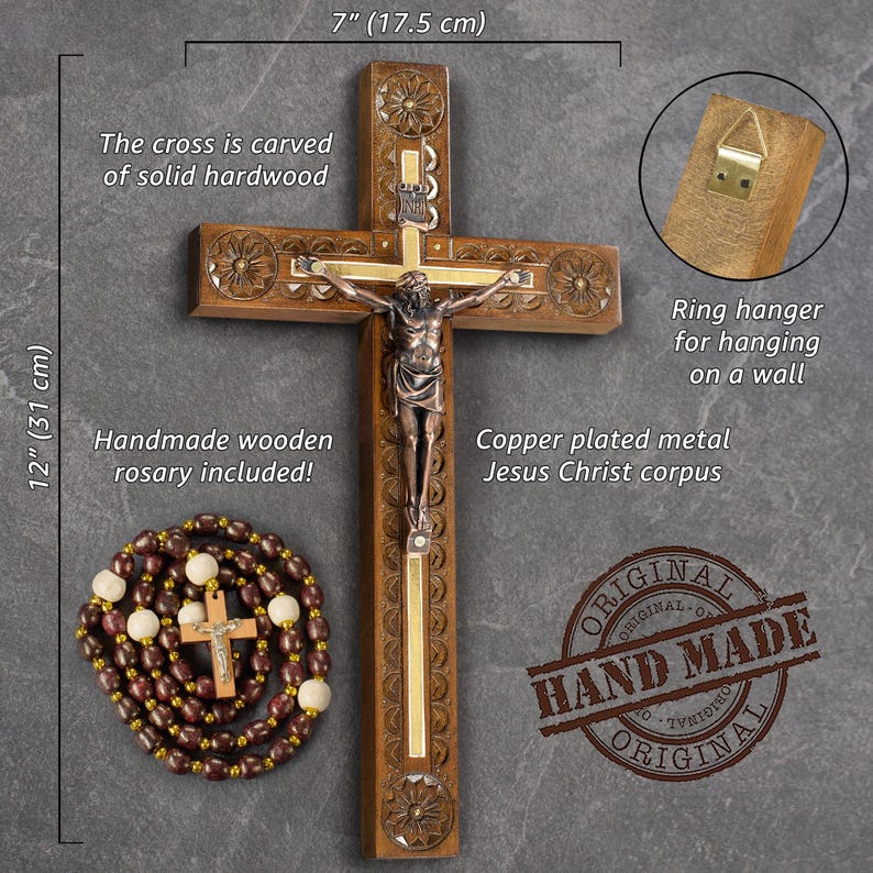 May include: A handcrafted wooden cross, 12 inches (31 cm) tall and 7 inches (17.5 cm) wide, with a copper-plated metal Jesus Christ corpus. Includes a handmade wooden rosary. The cross is carved from solid hardwood and has a ring hanger for wall display.