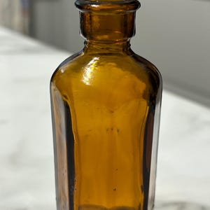 Vintage Milton Small Brown Octagonal Glass Medicine Chemist Apothecary Bottle