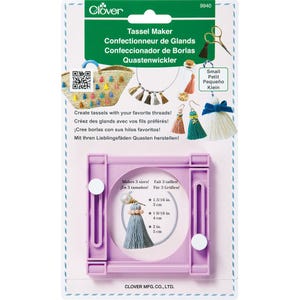 May include: A Clover brand Tassel Maker tool in light purple plastic, packaged on a card with instructions and illustrations. The tool features adjustable sliders to create tassels in three sizes: 3 cm, 4 cm, and 5 cm.