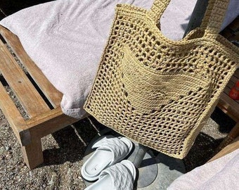 Bolso de paja de rafia trenzado para mujer, diseño de lujo, bolso de mano informal de gran capacidad, bolso de hombro hueco para vacaciones en la playa y verano