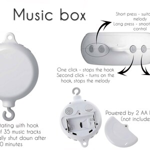 May include: White music box with a rotating hook and 35 music tracks. The music box has a control panel with buttons for volume, melody selection, and on/off switch. It is powered by two AA batteries (not included).