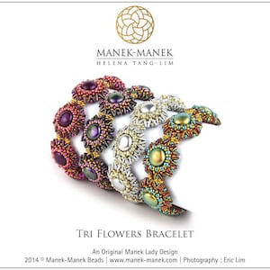 May include: Four beaded bracelets with a flower design. The bracelets are layered on top of each other. The bracelets are in shades of pink, purple, silver, and green.