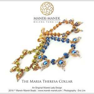 May include: A gold, green, and blue beaded necklace with a large blue bead in the center. The necklace is called "The Maria Theresa Collar" and is an original Manek Lady design.