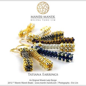 May include: A set of six pairs of gold, silver, and blue beaded earrings. The earrings are all different lengths and have a variety of bead patterns. The earrings are labeled "Tatiana Earrings" and "An Original Manek Lady Design".