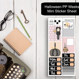 May include: A Halloween themed mini sticker sheet with a witch, pumpkin, and other spooky designs. The sheet includes days of the week and the text "Halloween 2019" and "Boo-tiful".