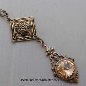 Swarovsi crystal light peach antique gold Necklace pendant