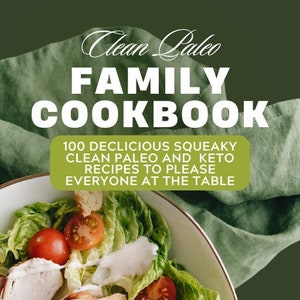 May include: A close-up of a salad with grilled chicken, cherry tomatoes, croutons, and a creamy dressing. The salad is in a white bowl with a gold rim. The text "Clean Paleo Family Cookbook" is in the background.