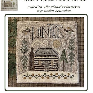 May include: A punch needle pattern for a winter cabin scene with the word "Winter" in a cursive font. The finished piece measures 6 3/4 inches by 6 3/4 inches.
