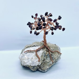 Garnet chip tree on Lepidolite/Clevelandite