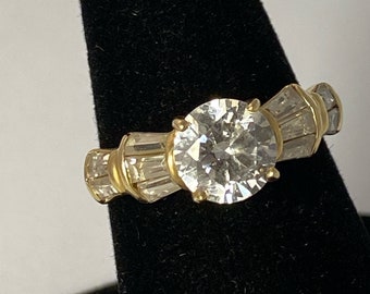 10k Gold Ring with 6mm Round CZ center stone - size 7