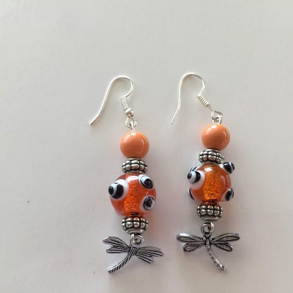 Fun & Flirty orange drop and dragonfly silver earrings