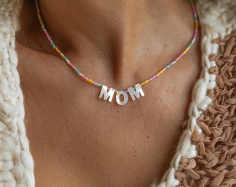 Handcrafted Mother of Pearl Letter Necklace. Strand of Pastel-Colored Seed Beads. Perfect Mother's Day Gift. Fun Jewelry. Everyday Style