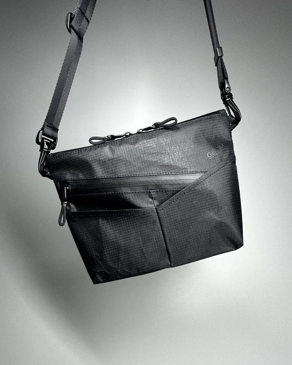 防水X-Pacメッセンジャーバッグ：テックウェア通勤用ショルダーバッグ