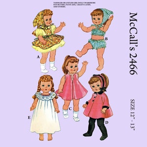 May include: A vintage sewing pattern for a doll's wardrobe. The pattern is for a 12-13 inch doll and includes five different outfits: a dress with a floral print, a swimsuit, a pink dress, a pink coat with black trousers, and a white nightgown. The pattern is titled "McCall's 2466".