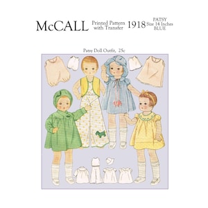 May include: McCall's Printed Pattern 1918 Patsy Doll Outfit, Size 14 inches, Blue.  The pattern includes a dress, a coat, a hat, and a pair of pants.  The doll is wearing a blue dress with a white collar and a white hat.