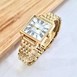 Gold Colour Women Wrist Watch, Gold Colour Band, Square Design, Silver Dial, Two-Stage Buckle, Minimal, Roman Numerals On Dial,