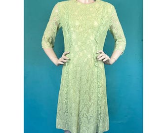 Abito mod a tubino trasparente con maniche a tre quarti in pizzo verde lime, stile anni '60, taglia media
