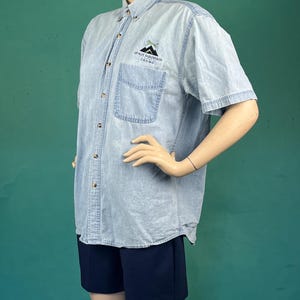 Vintage 90s Spirit Mountain Casino Denim Short Sleeve Collared Cotton Button Up size Small
