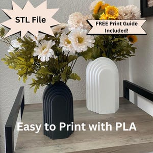 May include: Two decorative vases, one black and one white, each holding artificial flowers. The black vase has an arched design, and the white vase has a similar style. Text on the image reads "STL File" and "Easy to Print with PLA."