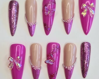 Press on nails butterfly, marbré, fleurs, perles Forme image : stiletto Long pink et beige