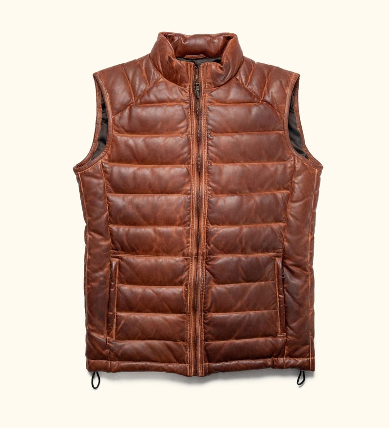 men puffer vest, men's down vest, down vest, mens puffer vest with hood, mens puffer vest black, quilted vest men, mens brown puffer vest, nike puffer vest, leather puffer vest men, lightweight puffer vest men, padded vest men, men's down puffer vest