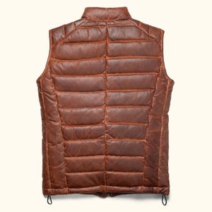 men puffer vest, men's down vest, down vest, mens puffer vest with hood, mens puffer vest black, quilted vest men, mens brown puffer vest, nike puffer vest, leather puffer vest men, lightweight puffer vest men, padded vest men, men's down puffer vest